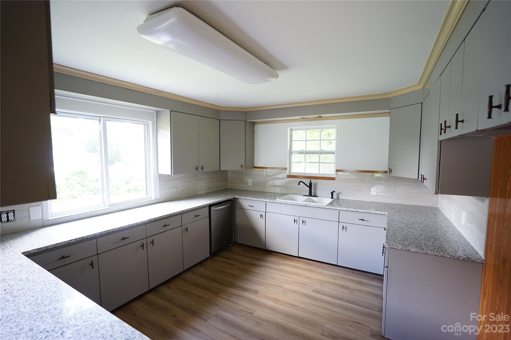 1811 Little Rock Road Charlotte, NC 28214 - Photo 4 of 20 a large kitchen with a large window
