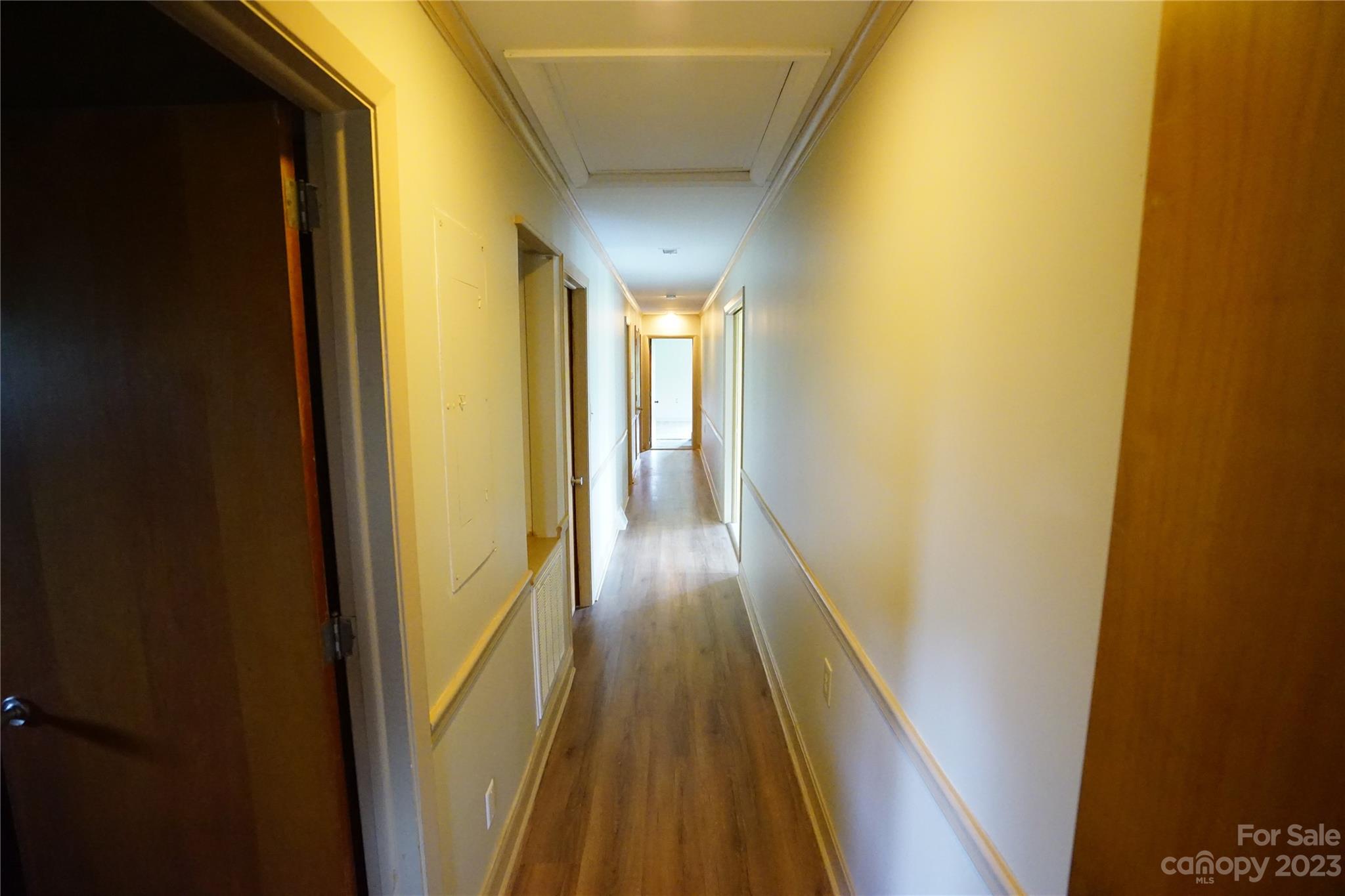1811 Little Rock Road Charlotte, NC 28214 - Photo 8 of 20 a view of a hallway with wooden floor