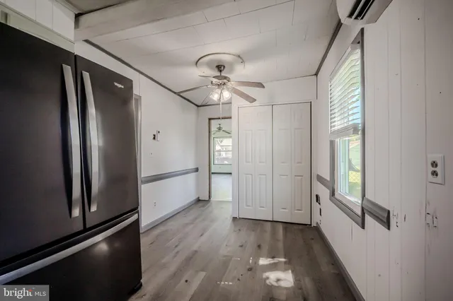 a view of entryway with wooden floor