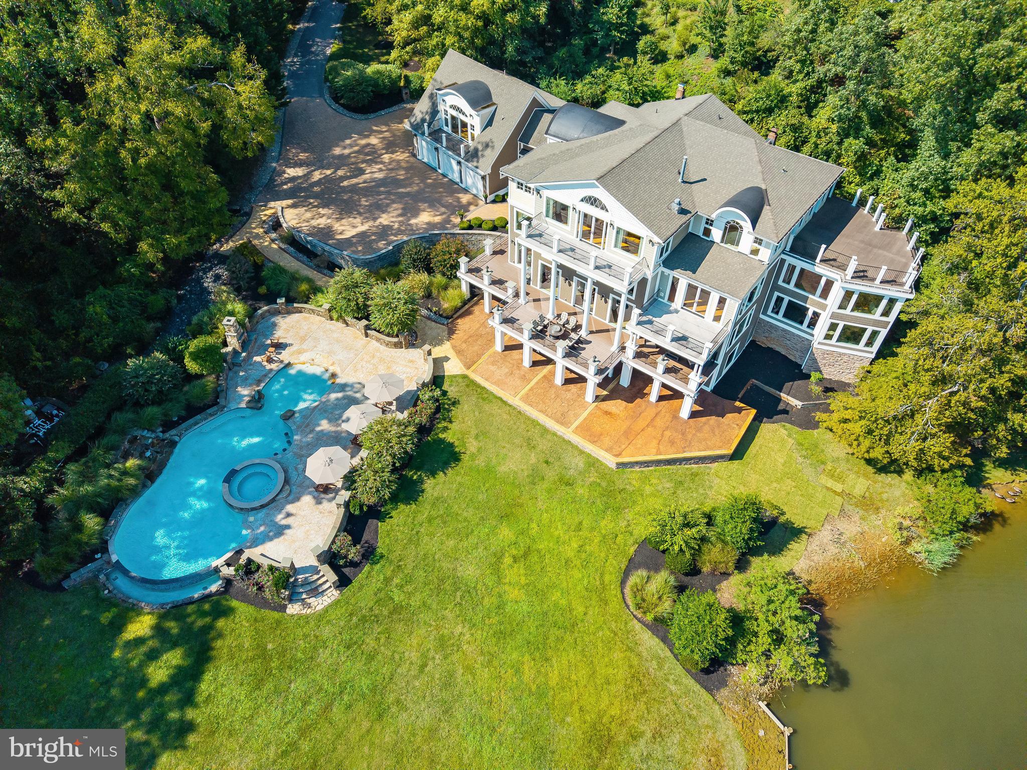 125 South Winchester Road Annapolis, MD 21409 - Photo 44 of 47 an aerial view of a house with swimming pool and outdoor seating