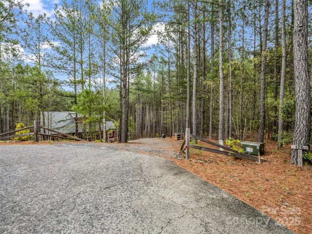 a view of a park with swings and slides