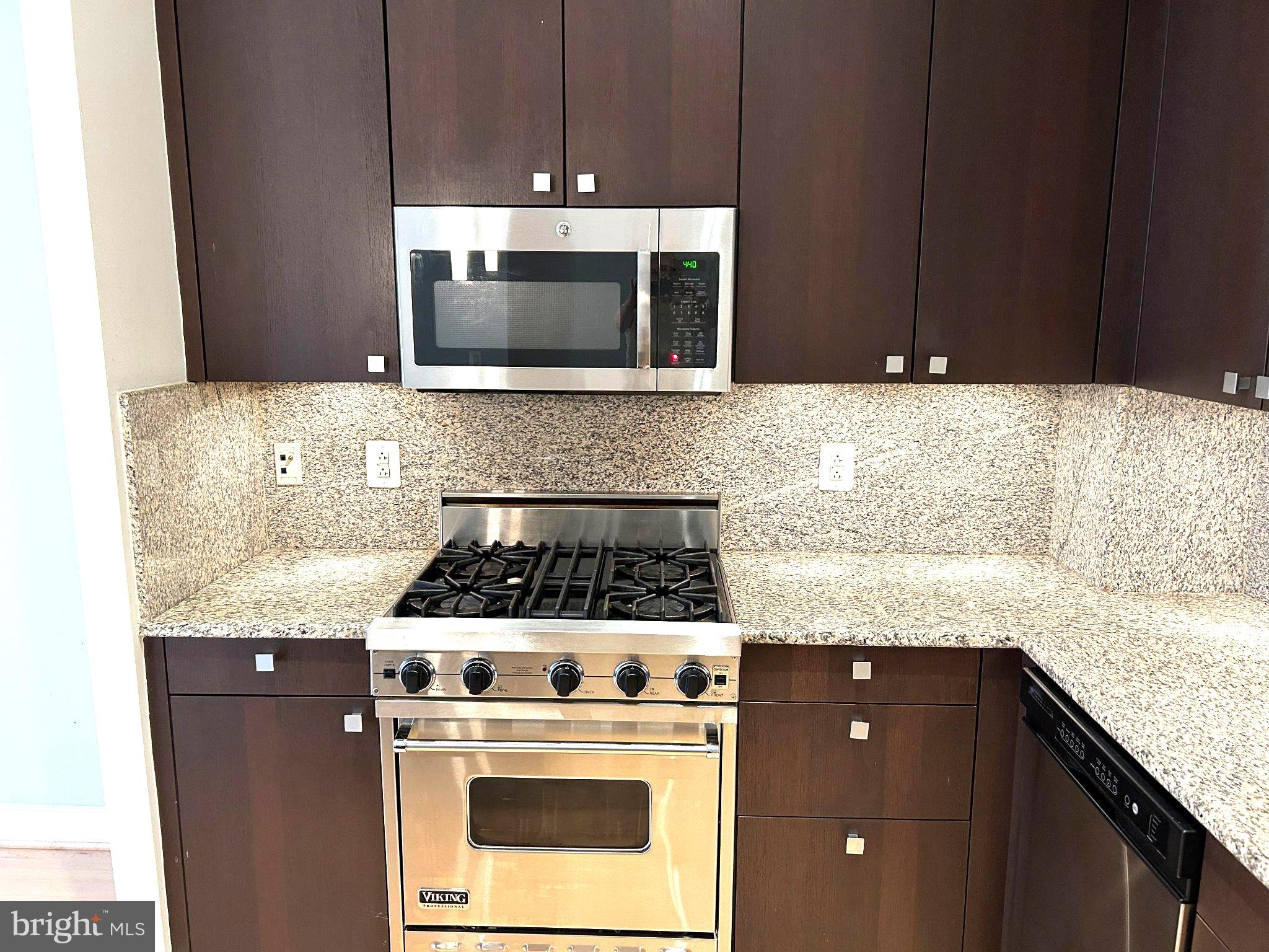 2425 L Street Northwest, Unit 421 Washington, DC 20037 - Photo 6 of 18 Sleek kitchen with modern finishes.