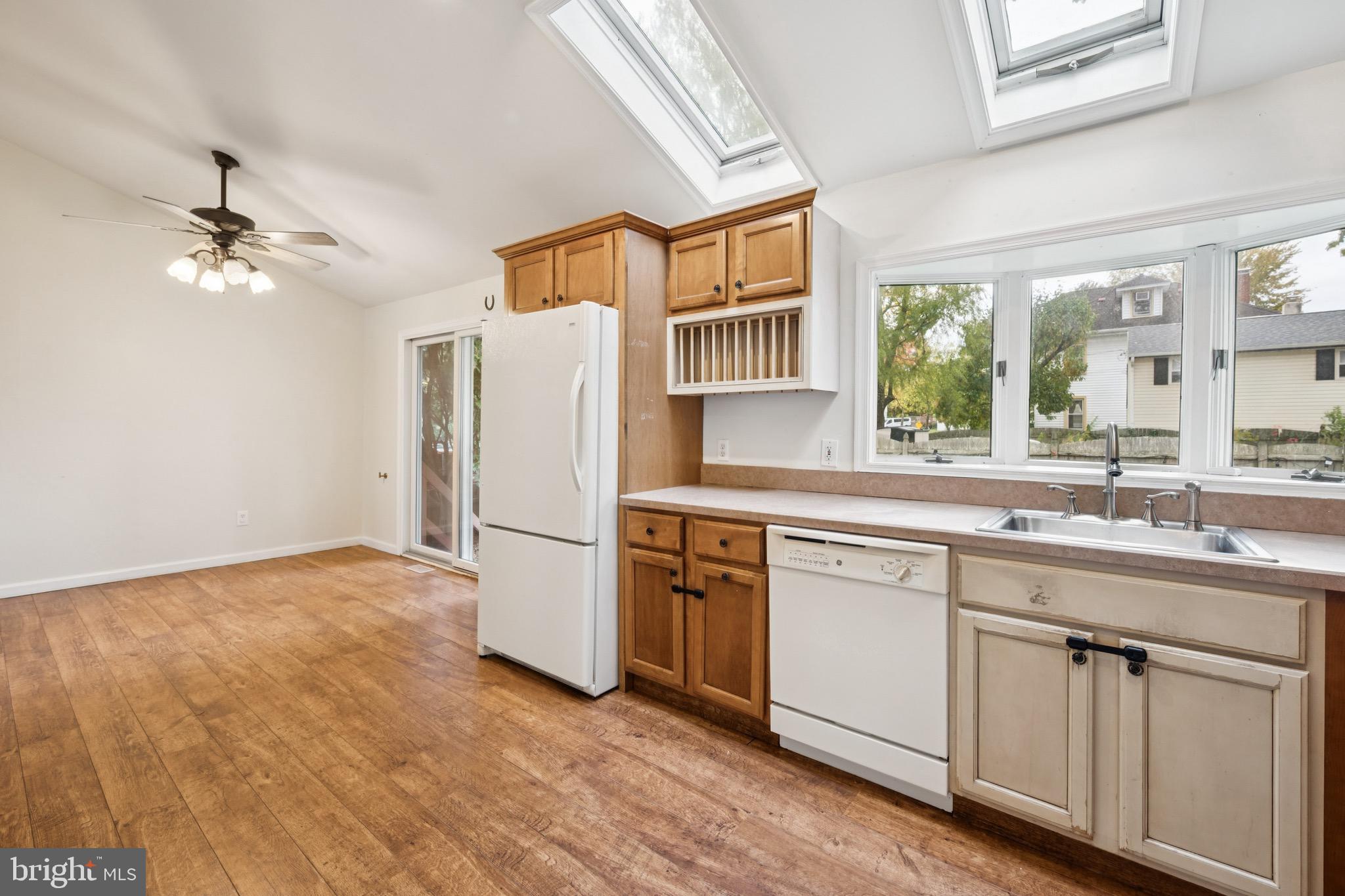 166 Ellis Street Haddonfield, NJ 08033 - Photo 15 of 25 a kitchen with white cabinets and white appliances
