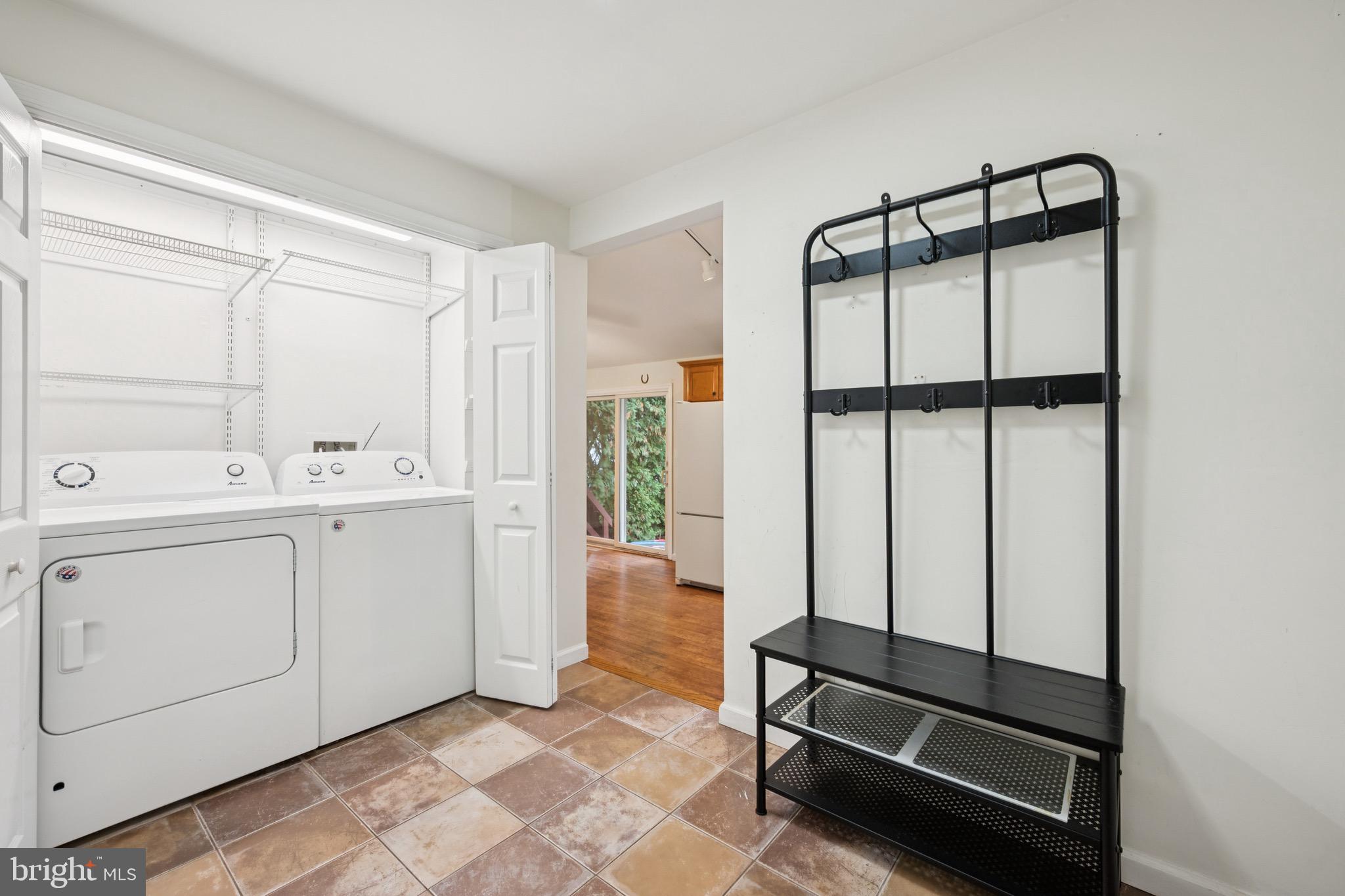 166 Ellis Street Haddonfield, NJ 08033 - Photo 17 of 25 a spacious bathroom with a double vanity sink and a mirror