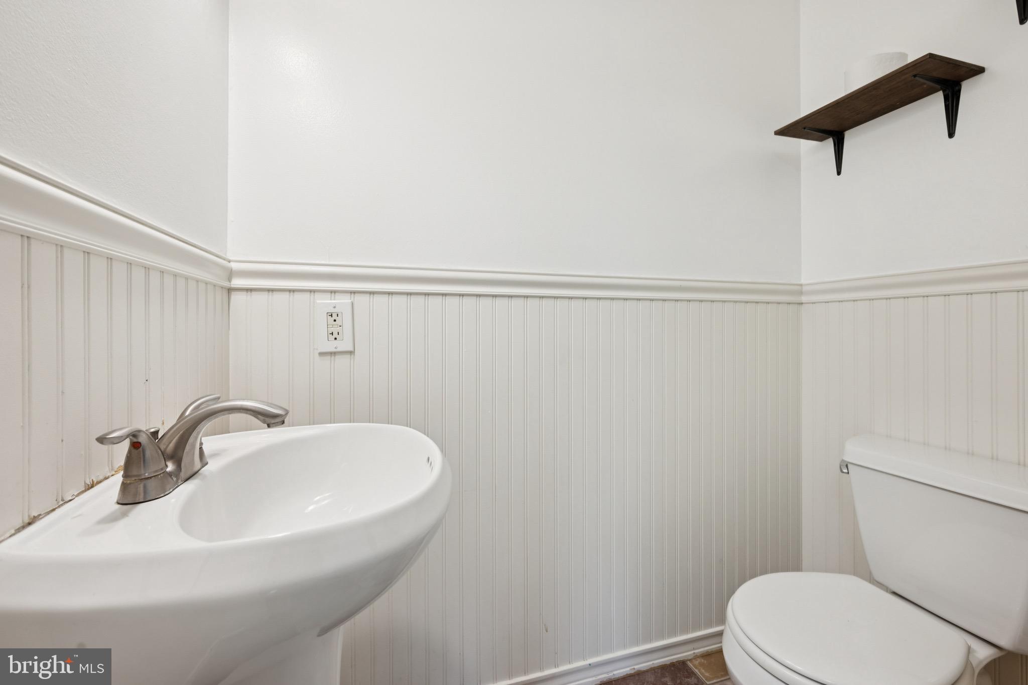 166 Ellis Street Haddonfield, NJ 08033 - Photo 18 of 25 a bathroom with a sink a toilet and a mirror