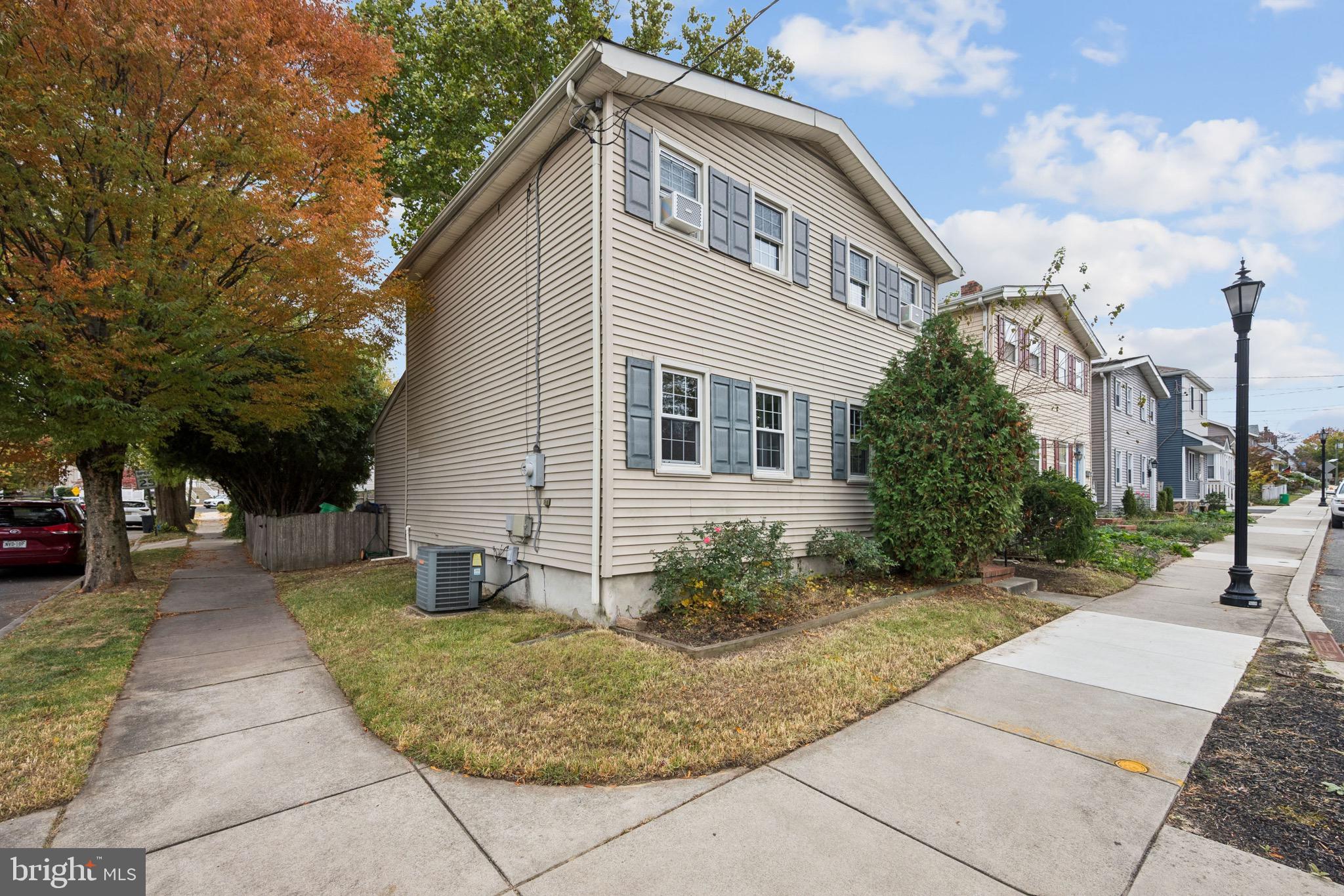 166 Ellis Street Haddonfield, NJ 08033 - Photo 2 of 25 a front view of a house with garden