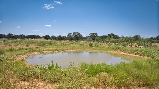 a view of lake and mountain