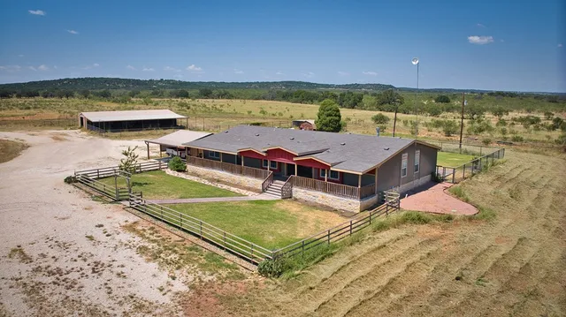 a view of a pool with an ocean view