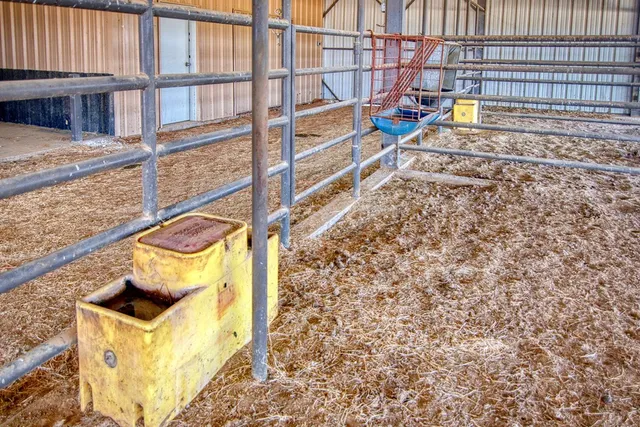 a view of a hallway with wooden shelves