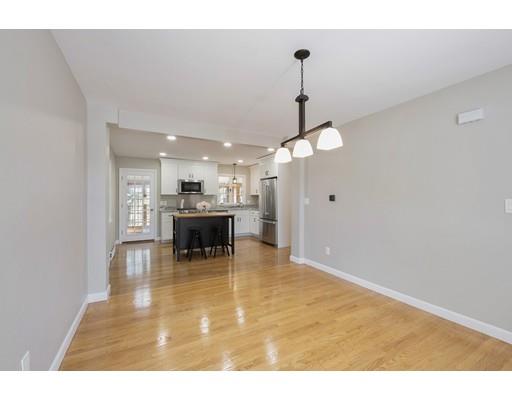 21 Coronet Avenue Methuen, MA 01844 - Photo 11 of 28 a dining room with furniture and wooden floor