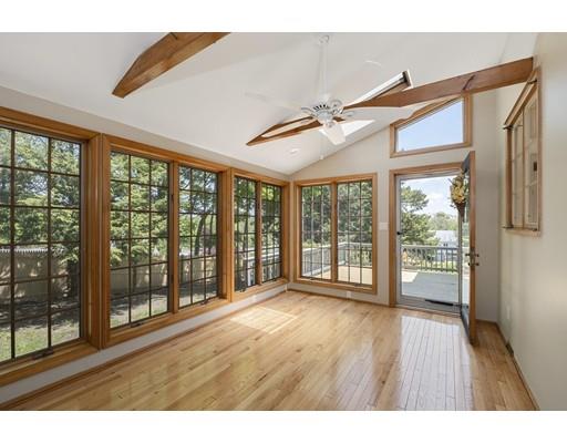 21 Coronet Avenue Methuen, MA 01844 - Photo 14 of 28 a view of an empty room with wooden floor and a window
