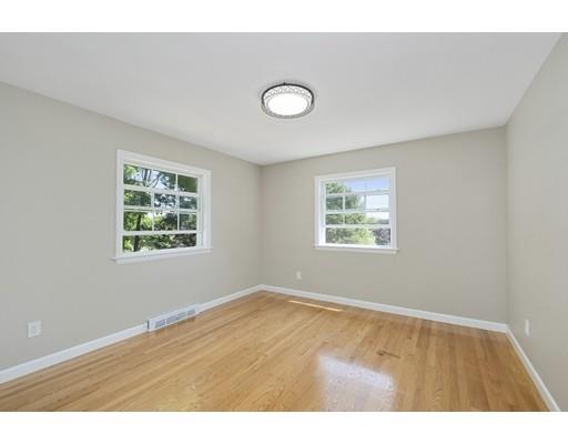 21 Coronet Avenue Methuen, MA 01844 - Photo 15 of 28 an empty room with wooden floor and windows