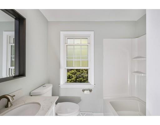 21 Coronet Avenue Methuen, MA 01844 - Photo 21 of 28 a bathroom with a sink and a window