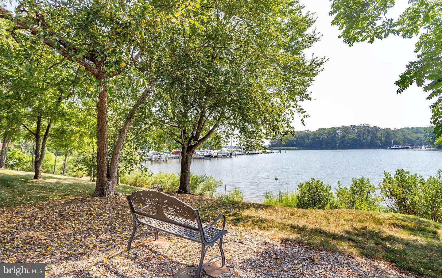 1100 South River Landing Road Edgewater, MD 21037 - Photo 49 of 51 a view of lake with table and chairs
