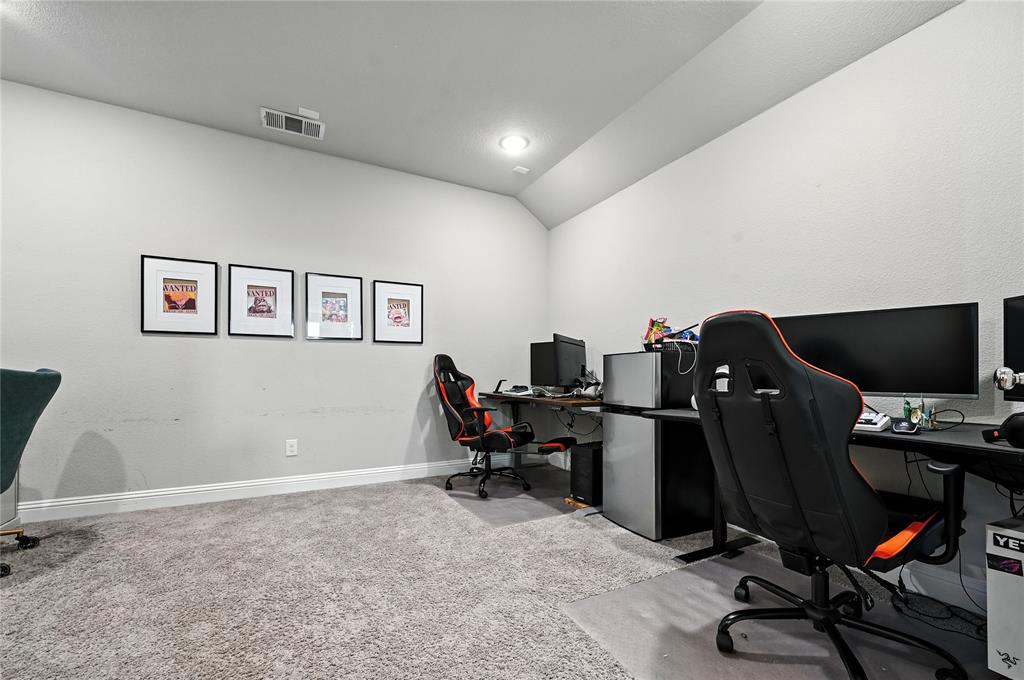 1160 Red Hawk Lane Forney, TX 75126 - Photo 14 of 33 a view of a workspace with furniture and air conditioner