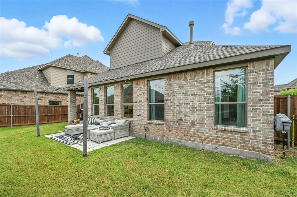 1160 Red Hawk Lane Forney, TX 75126 - Photo 23 of 33 a house with garden in front of it