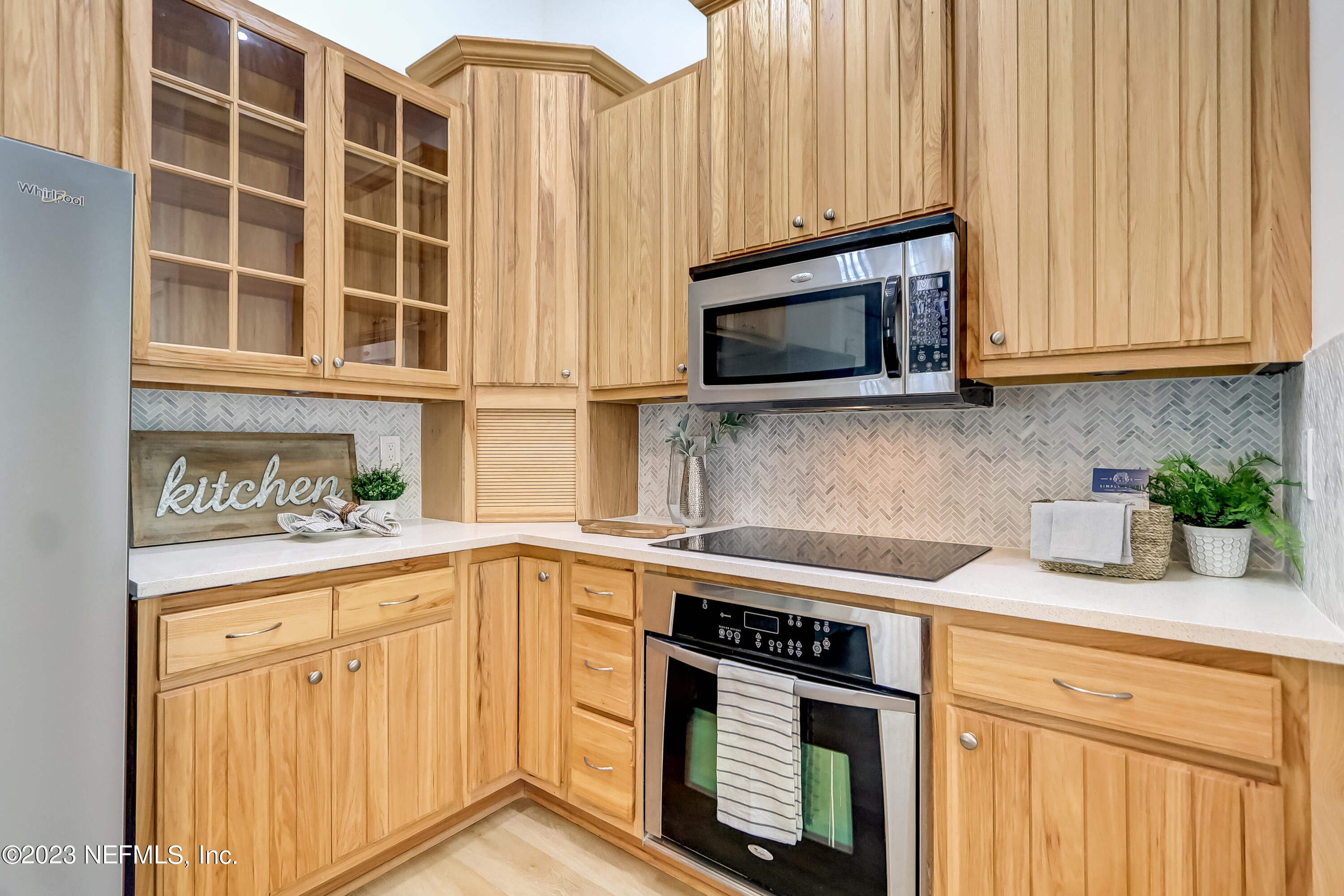 41 Turtleback Trail Ponte Vedra Beach, FL 32082 - Photo 11 of 41 a kitchen with stainless steel appliances granite countertop white cabinets and a microwave oven