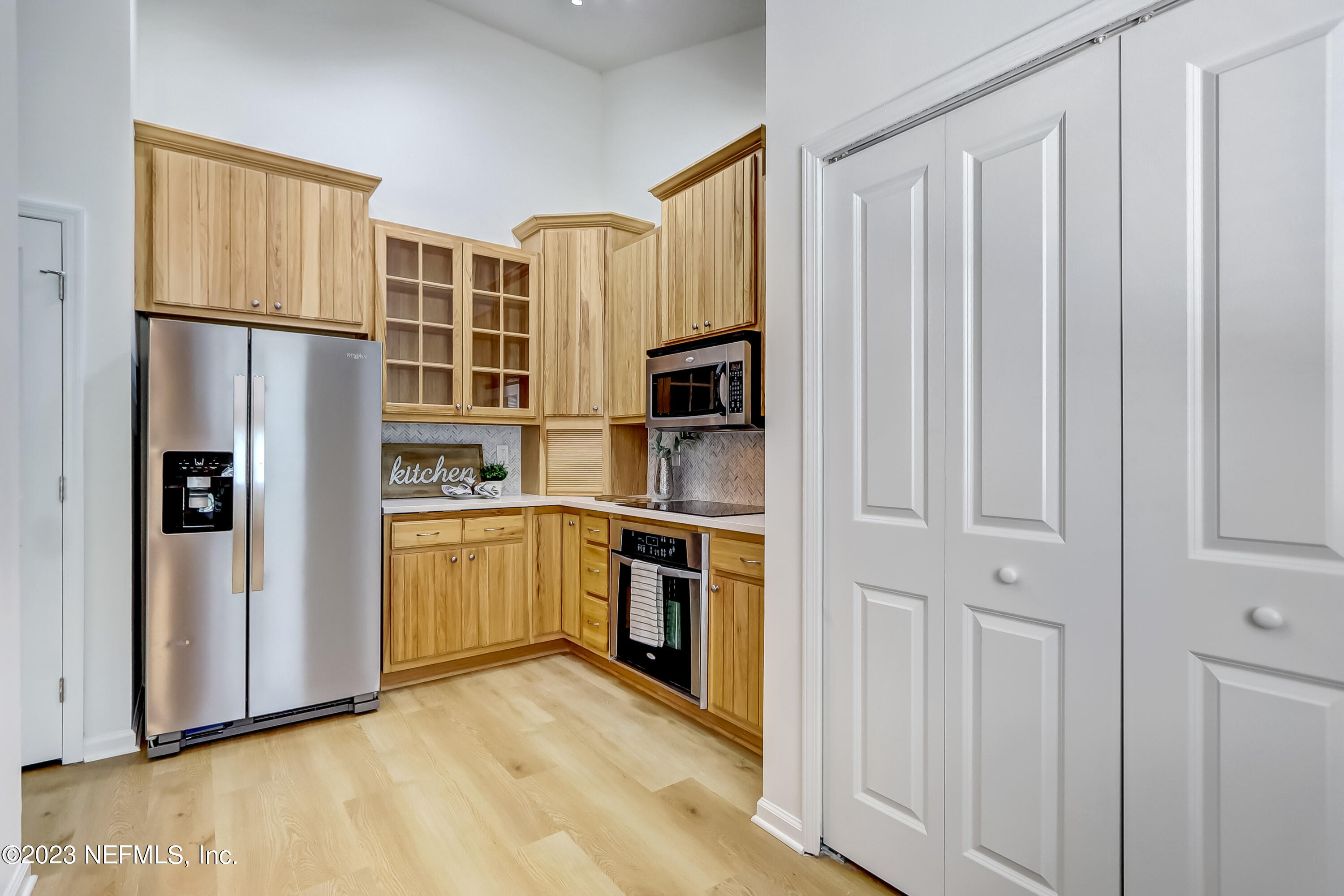 41 Turtleback Trail Ponte Vedra Beach, FL 32082 - Photo 13 of 41 a kitchen with stainless steel appliances a refrigerator and a stove
