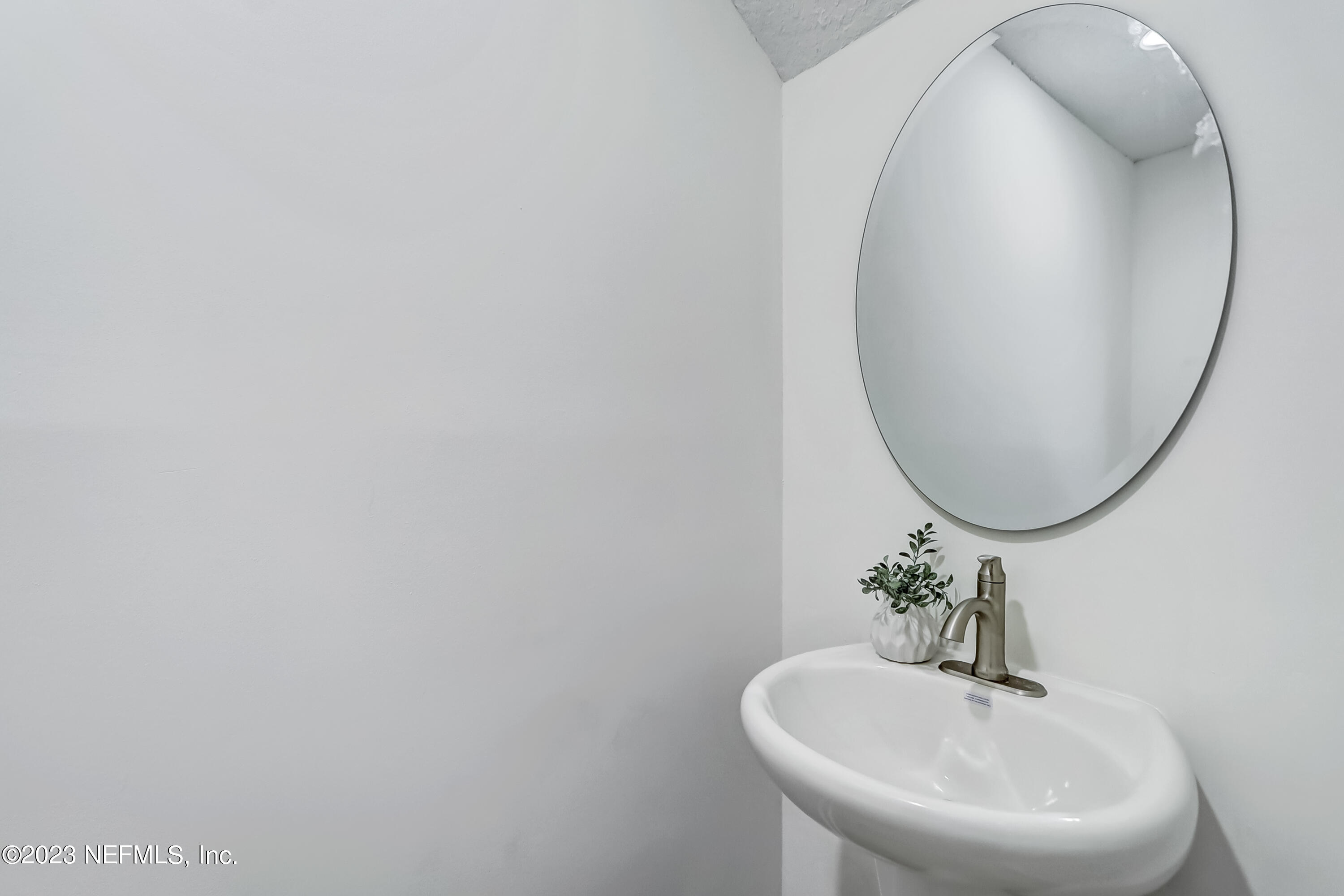41 Turtleback Trail Ponte Vedra Beach, FL 32082 - Photo 17 of 41 a bathroom with a sink and a mirror