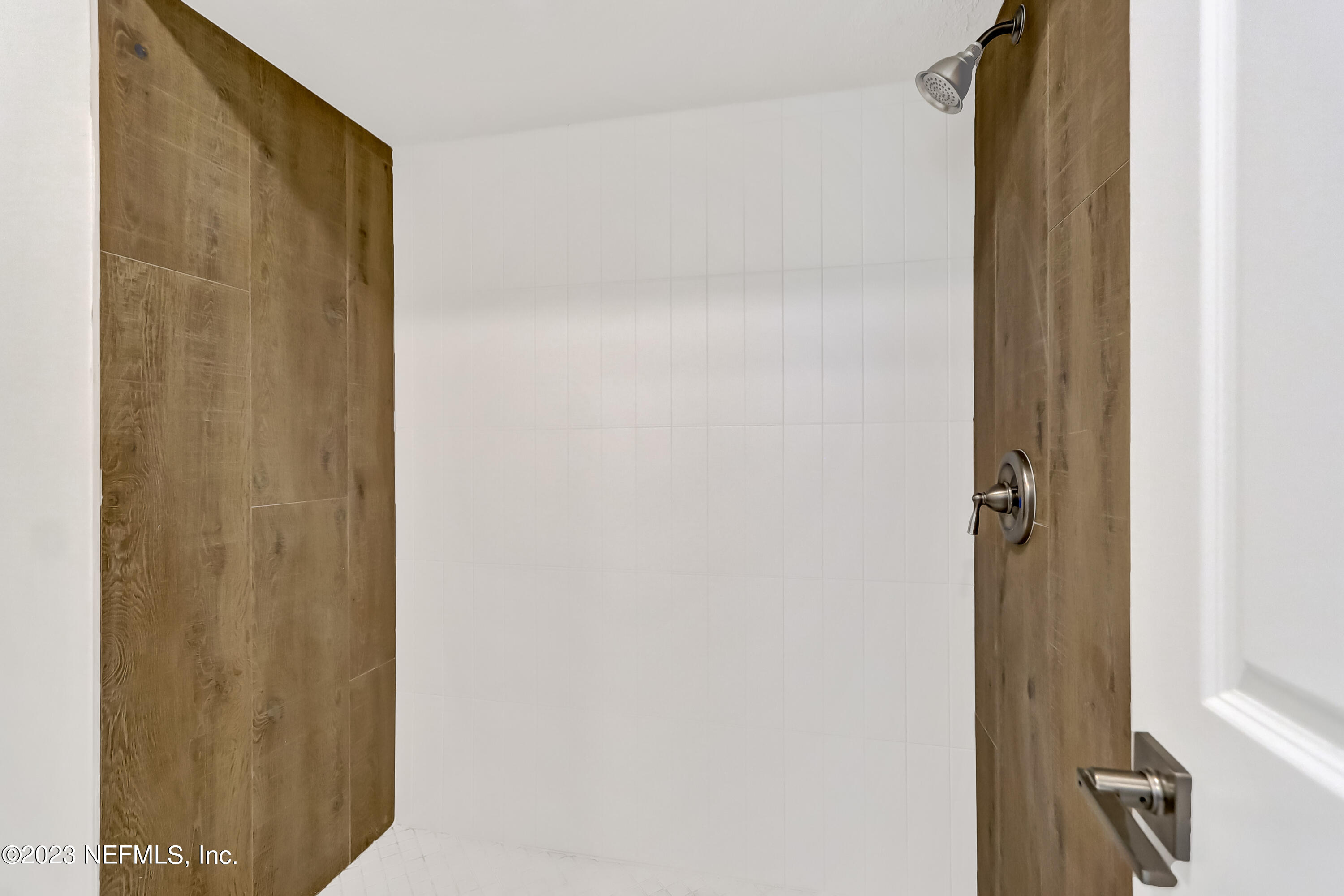 41 Turtleback Trail Ponte Vedra Beach, FL 32082 - Photo 23 of 41 a bathroom with a shower and a door