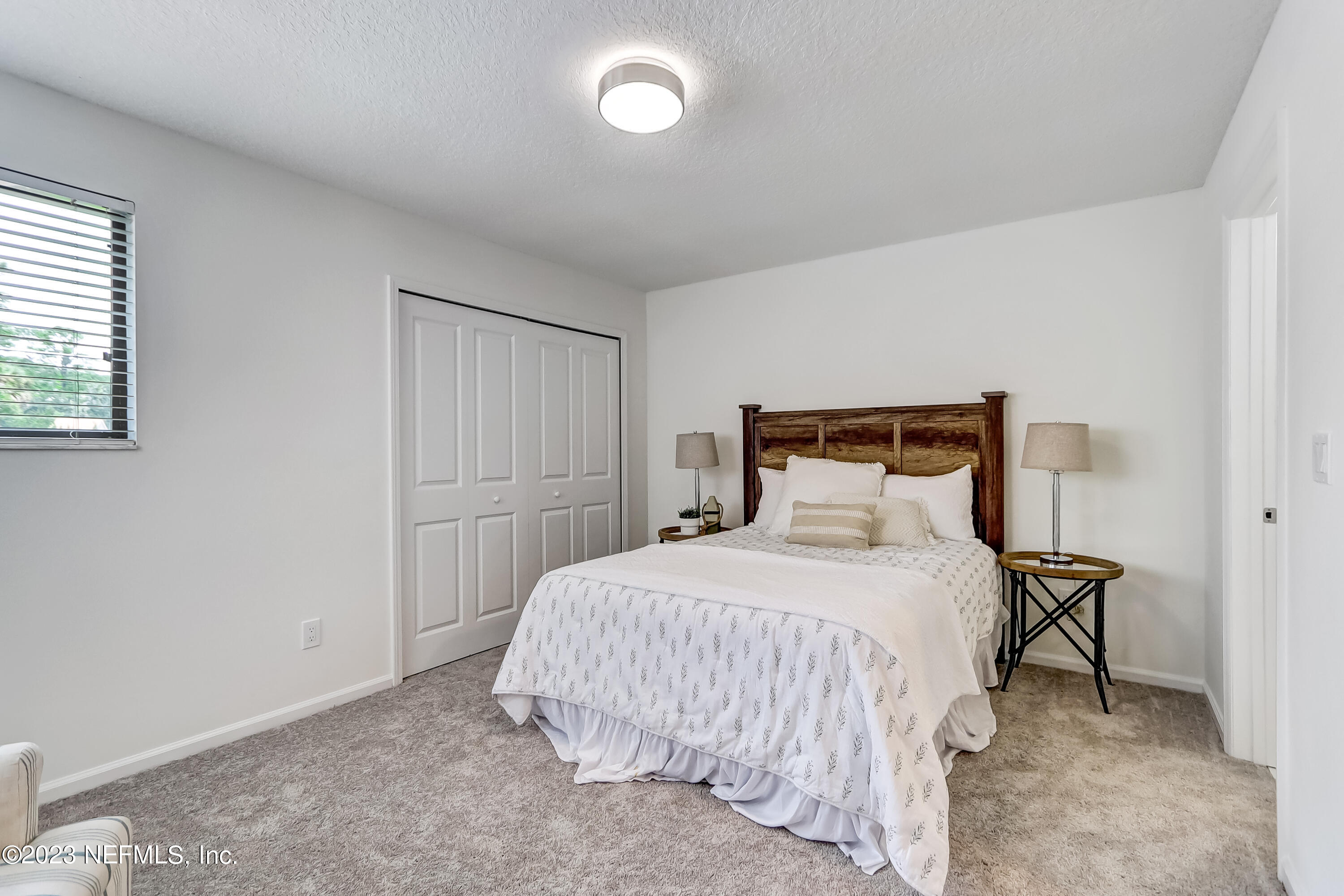 41 Turtleback Trail Ponte Vedra Beach, FL 32082 - Photo 26 of 41 a bedroom with a bed and window