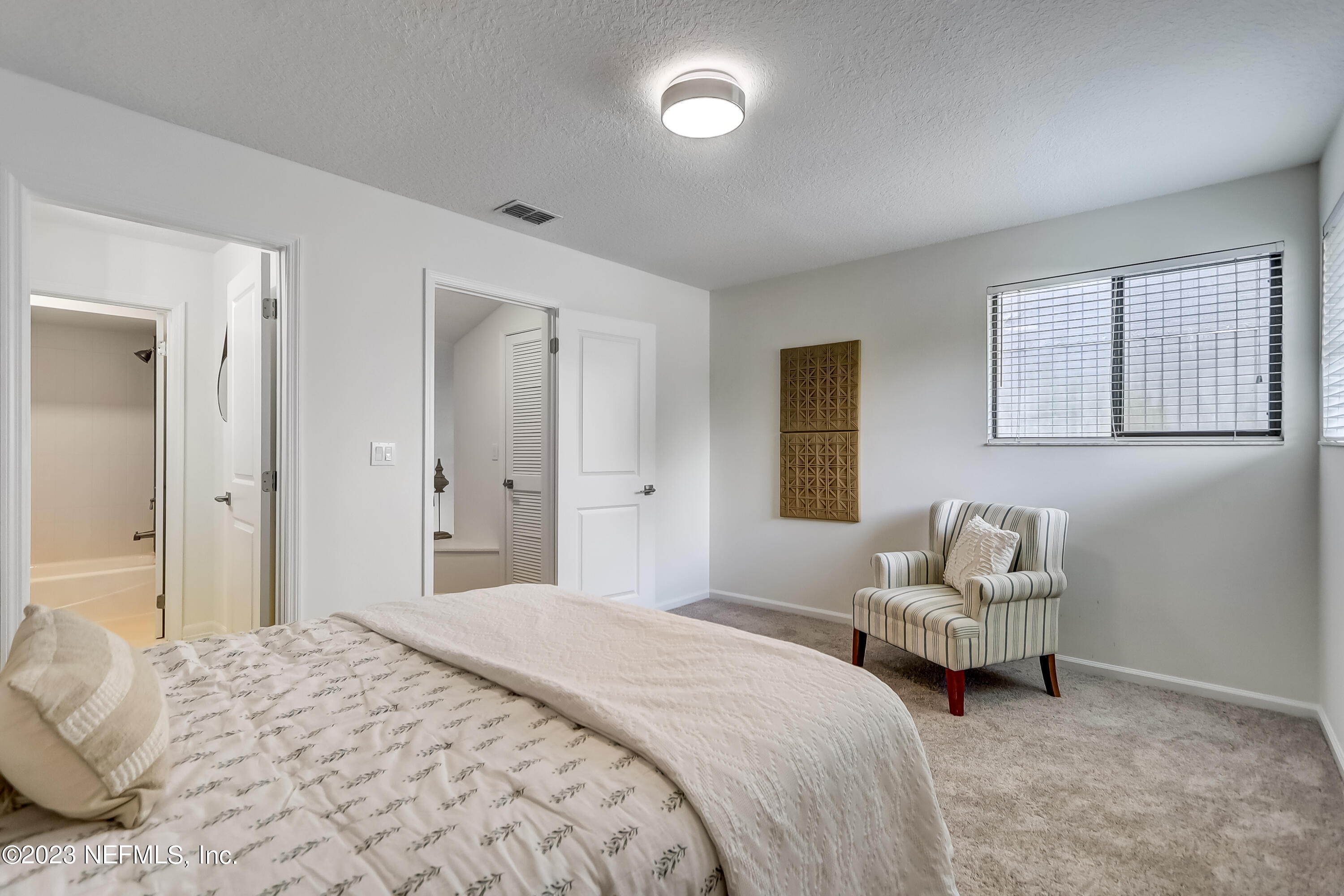 41 Turtleback Trail Ponte Vedra Beach, FL 32082 - Photo 28 of 41 a bedroom with a bed and a couch