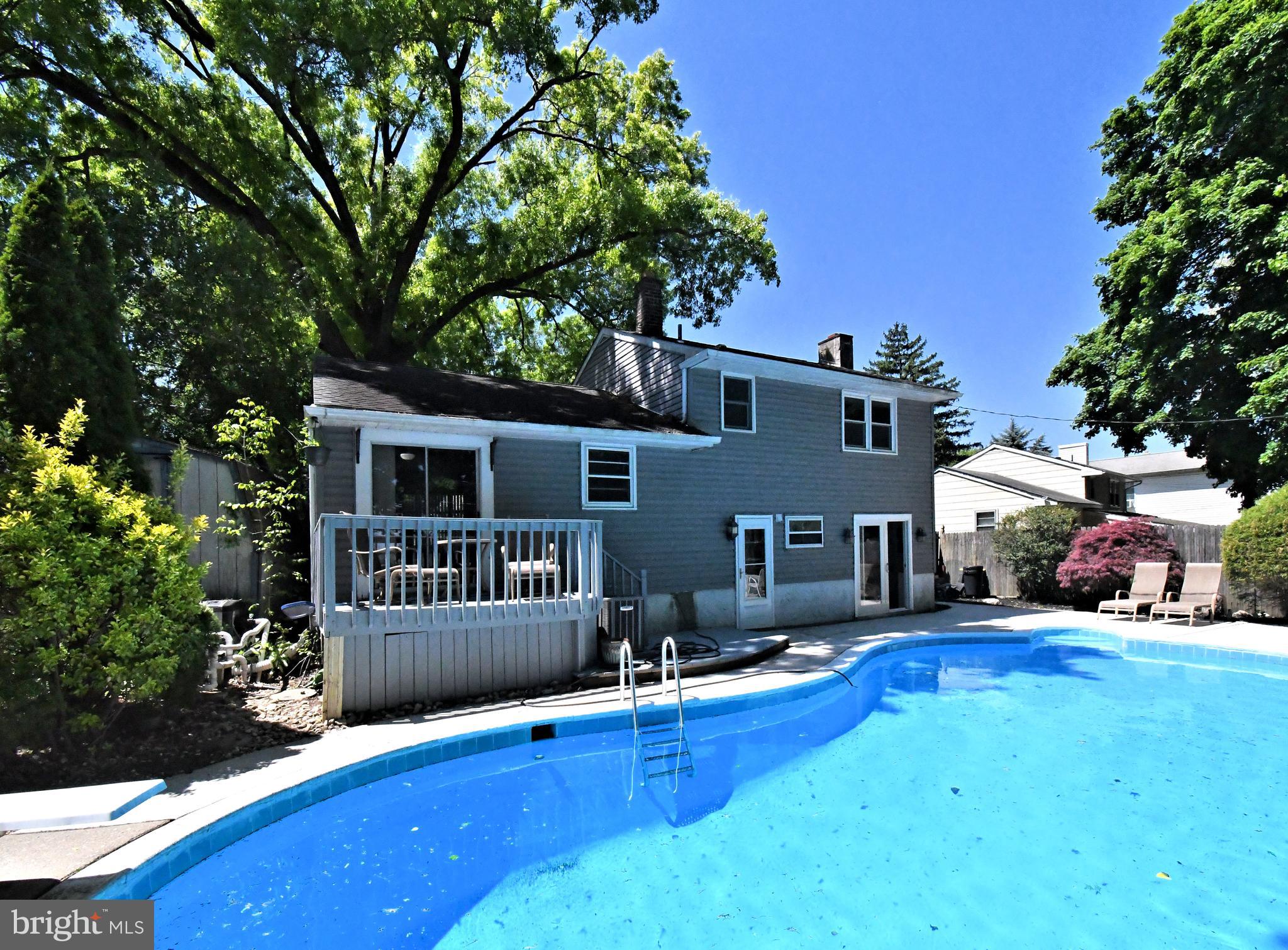 609 Mansfield Road Willow Grove, PA 19090 - Photo 52 of 68 a front view of house with yard outdoor seating and barbeque oven