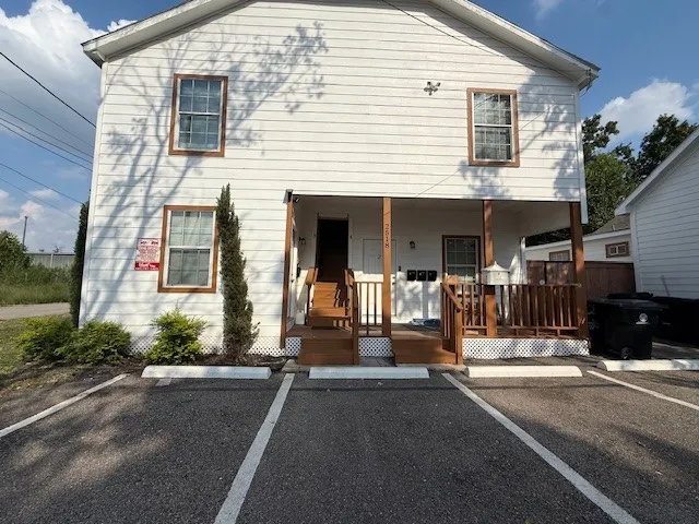 a view of a house with a street