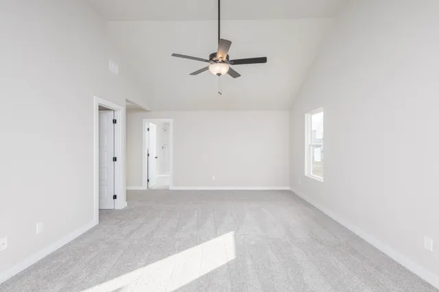a view of a chandelier fan in a room