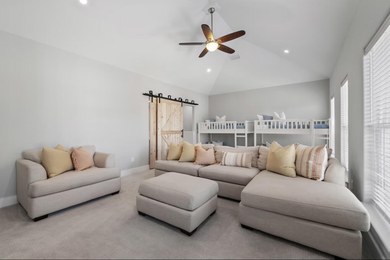 37 Grande Pointe Drive Inlet Beach, FL 32461 - Photo 22 of 58 a living room with furniture and a large window