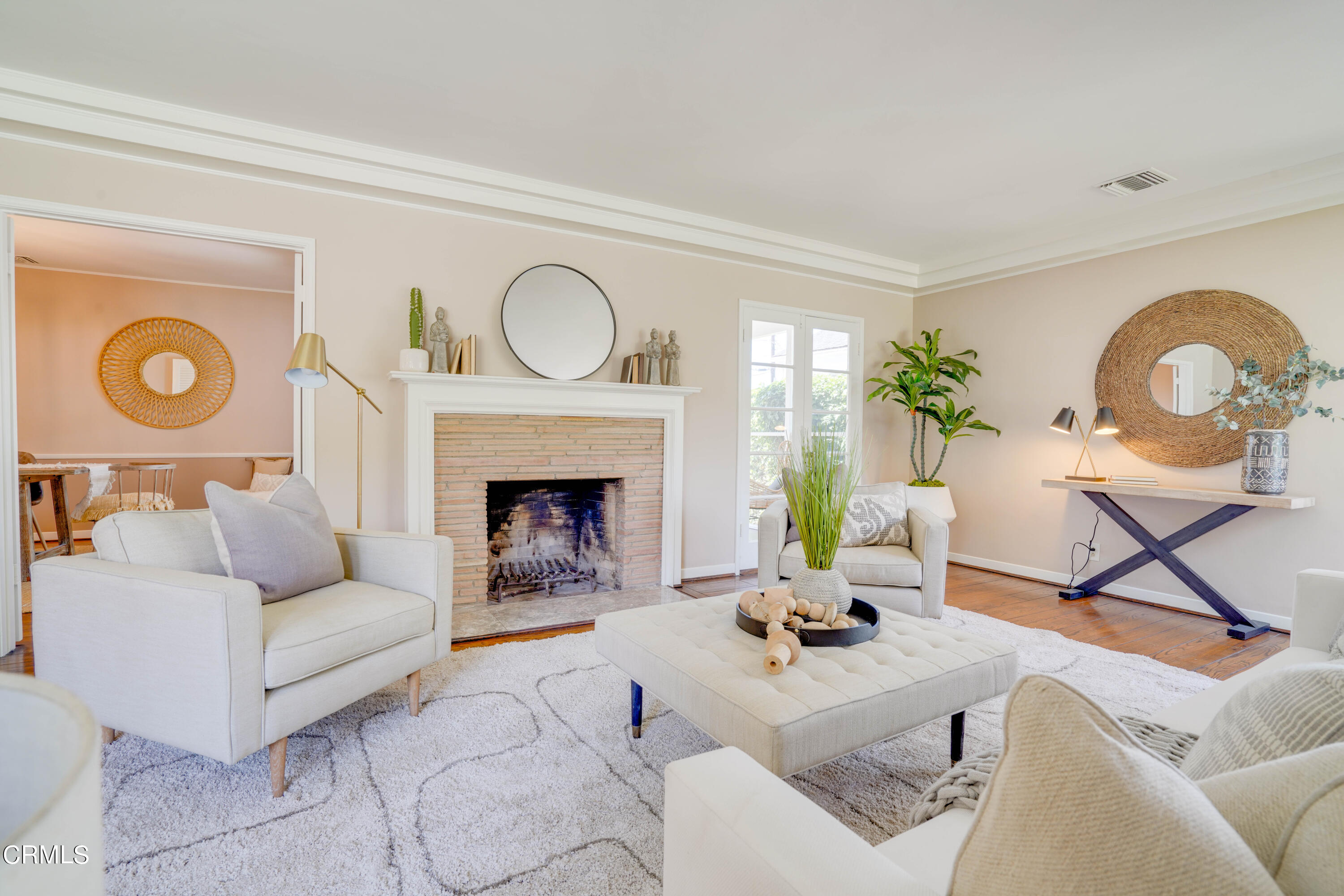 2540 Lambert Drive Pasadena, CA 91107 - Photo 7 of 30 a living room with furniture a rug and a fireplace