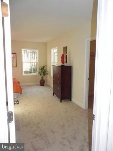 4933 Lee Street Northeast Washington, DC 20019 - Photo 11 of 21 a view of an empty room with furniture and a window