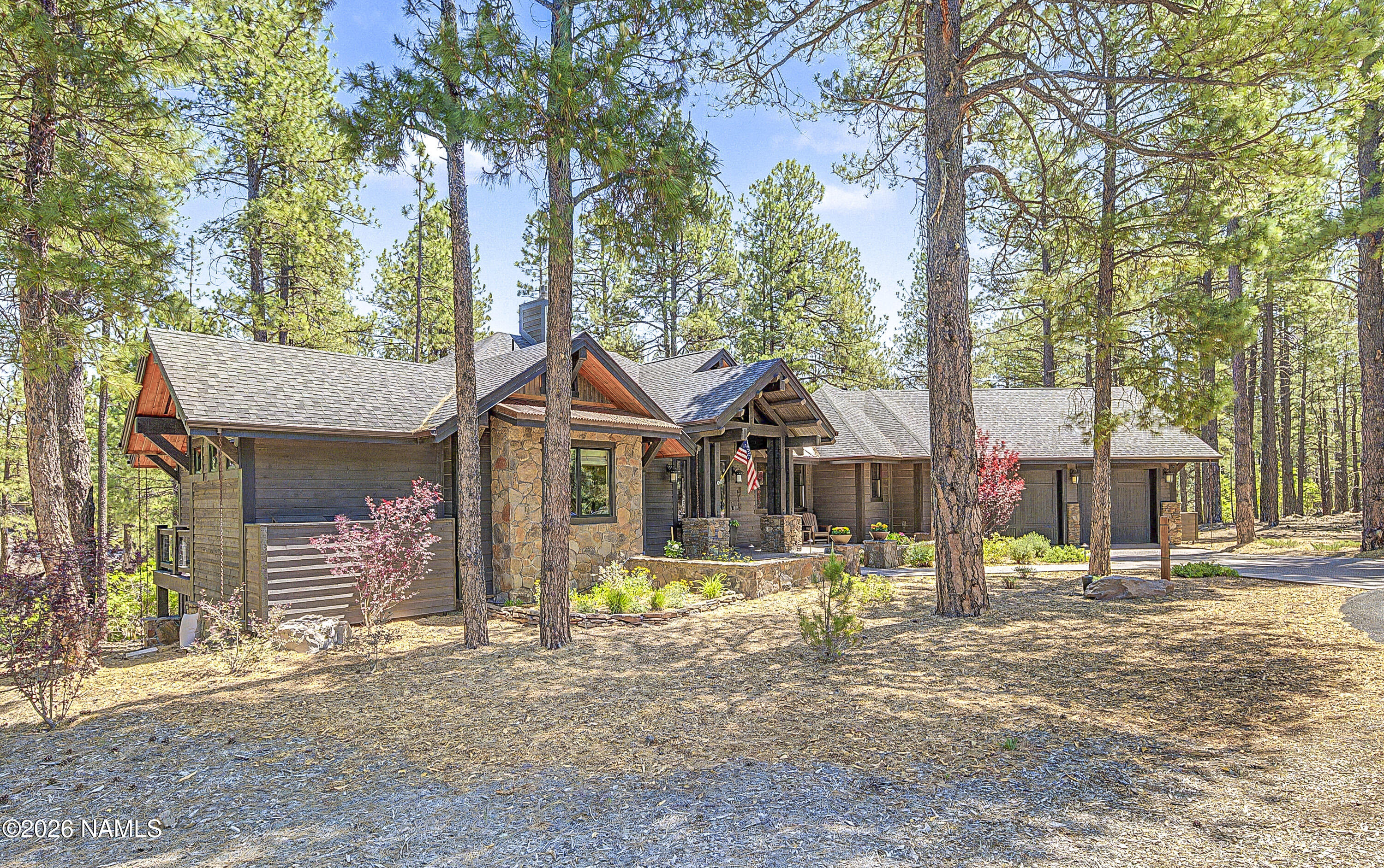 2409 T A Riordan Flagstaff, AZ 86005 - Photo 1 of 1 a front view of a house with a yard