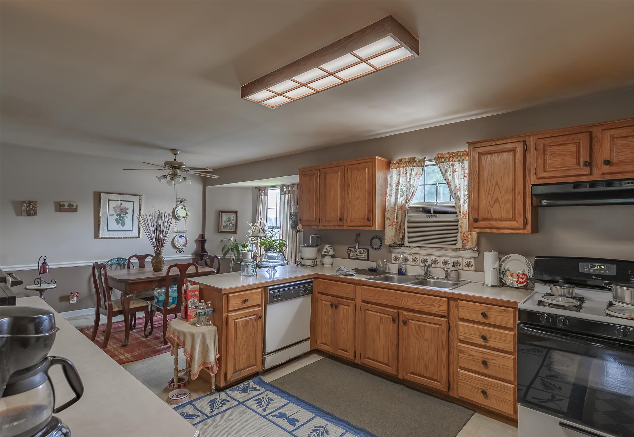 3013 York Road Pleasant View, TN 37146 - Photo 8 of 10 a kitchen with a sink stove and cabinets