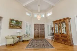 a living room with furniture or couch and a large window