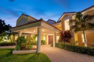 a front view of a house with garden