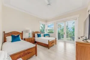 a bedroom with furniture and a window