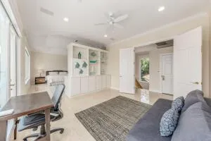 a large bathroom with a large tub and sink