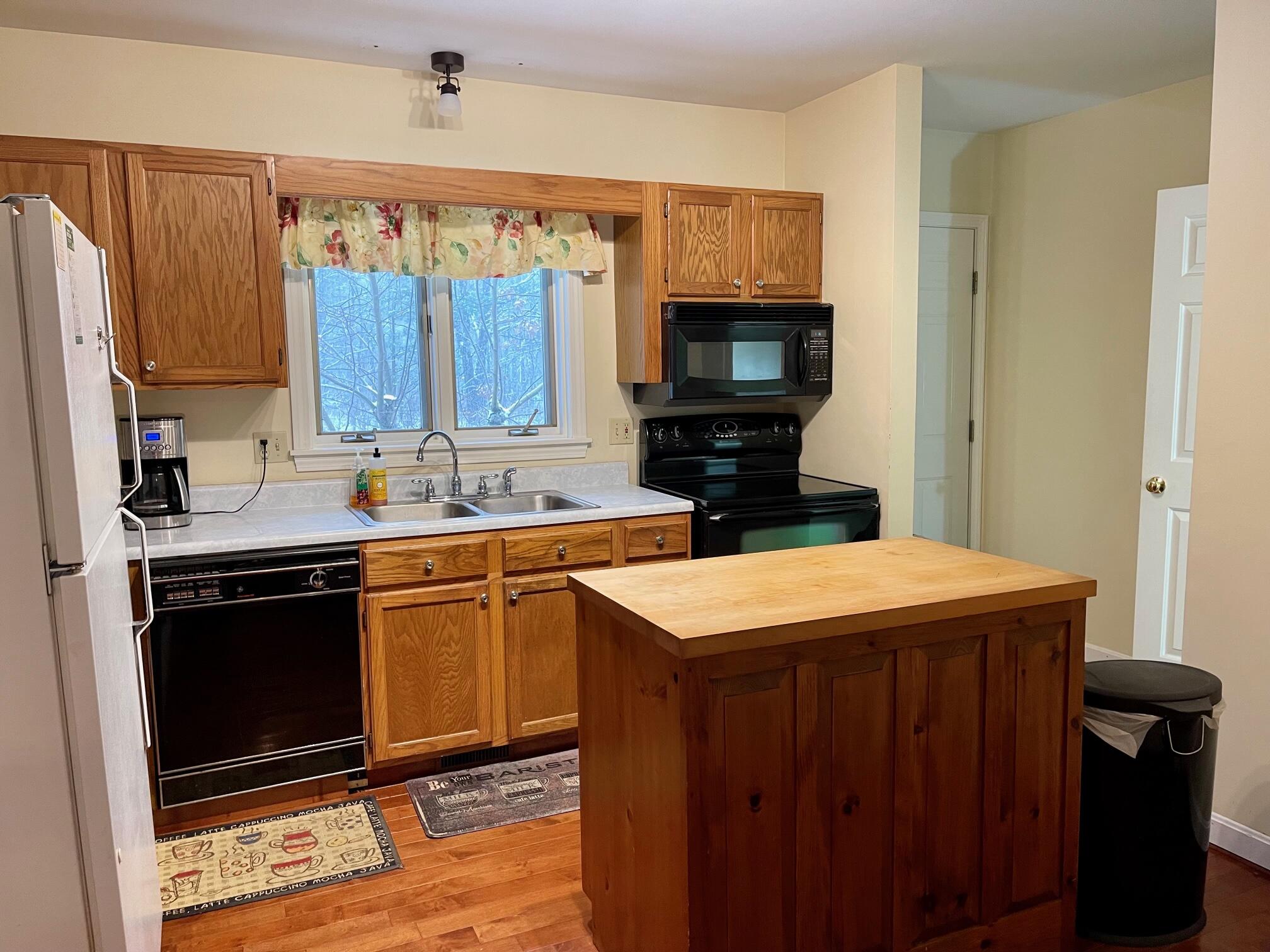 6 Cold Spring Lane Kennebunk, ME 04043 - Photo 15 of 49 Offers a butcherblock island