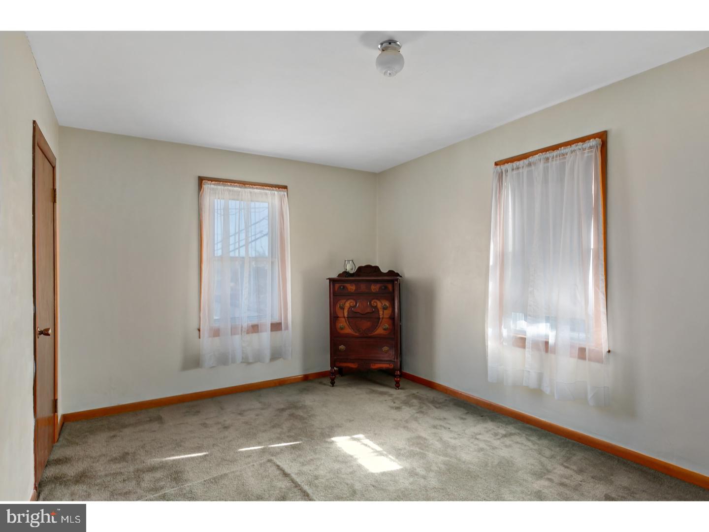 522 Heulings Avenue Riverside, NJ 08075 - Photo 15 of 22 a view of empty room with windows