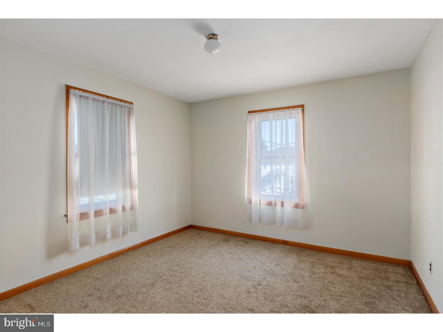 522 Heulings Avenue Riverside, NJ 08075 - Photo 16 of 22 a view of an empty room with a window