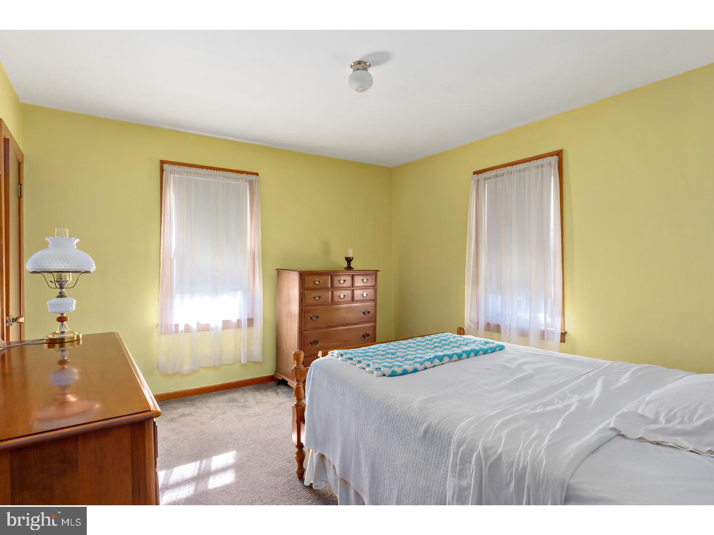 522 Heulings Avenue Riverside, NJ 08075 - Photo 18 of 22 a bedroom with a bed and wooden floor