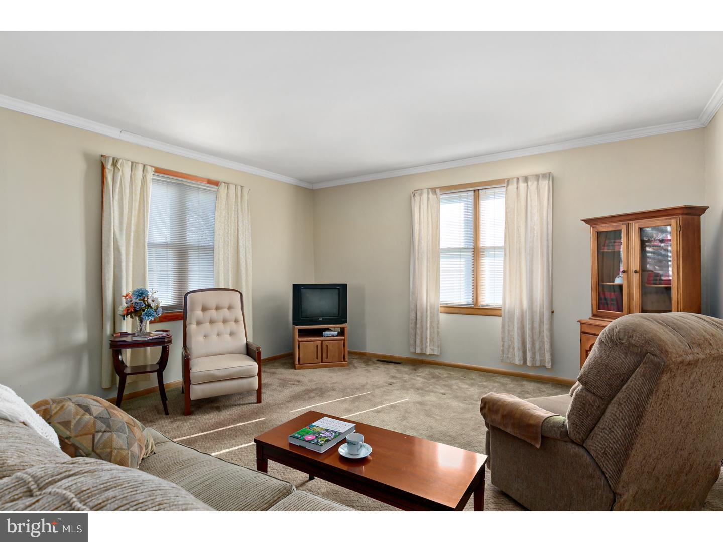 522 Heulings Avenue Riverside, NJ 08075 - Photo 4 of 22 a living room with furniture and a fireplace