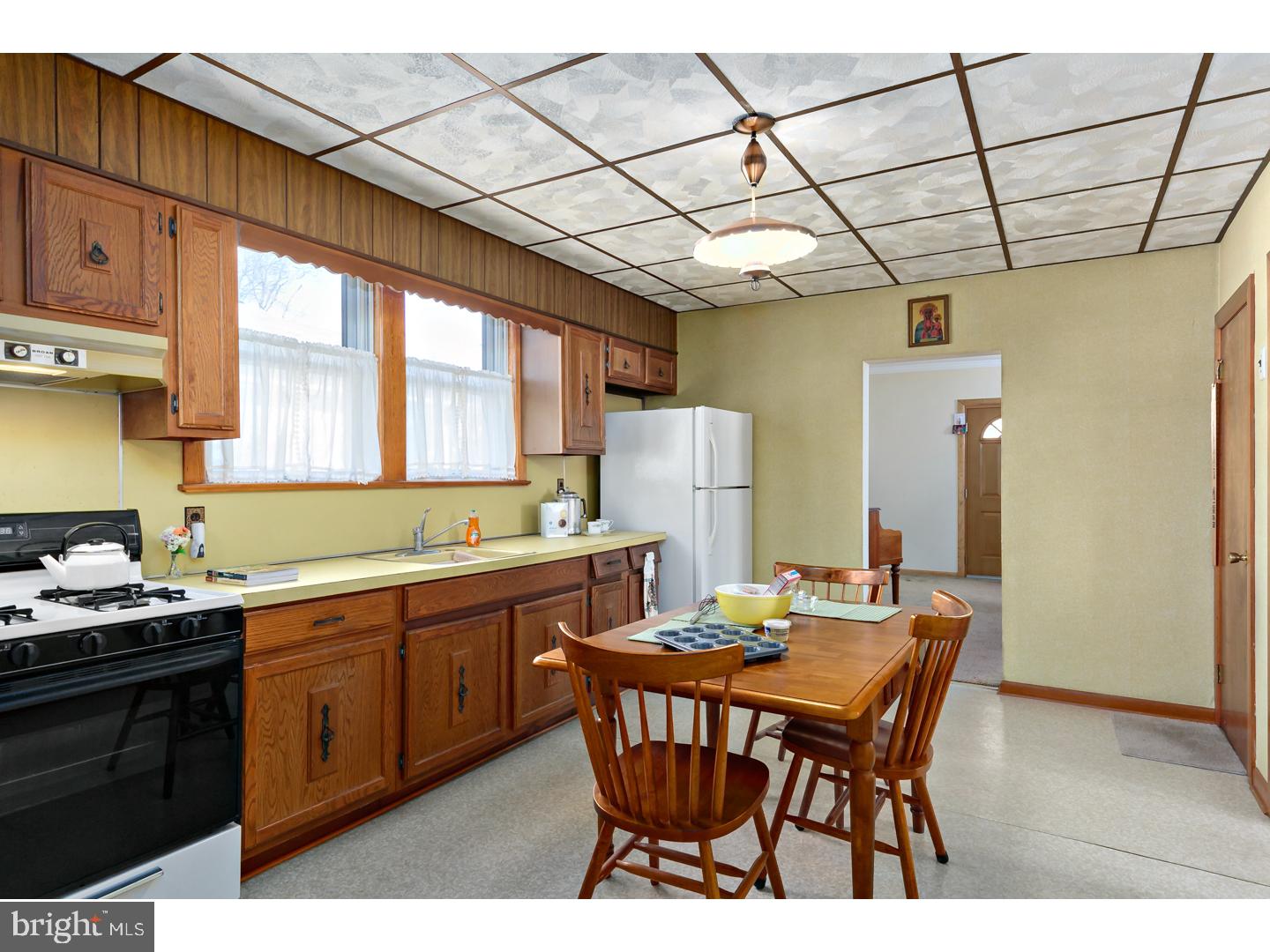 522 Heulings Avenue Riverside, NJ 08075 - Photo 7 of 22 a kitchen that has a cabinets counter space and a sink