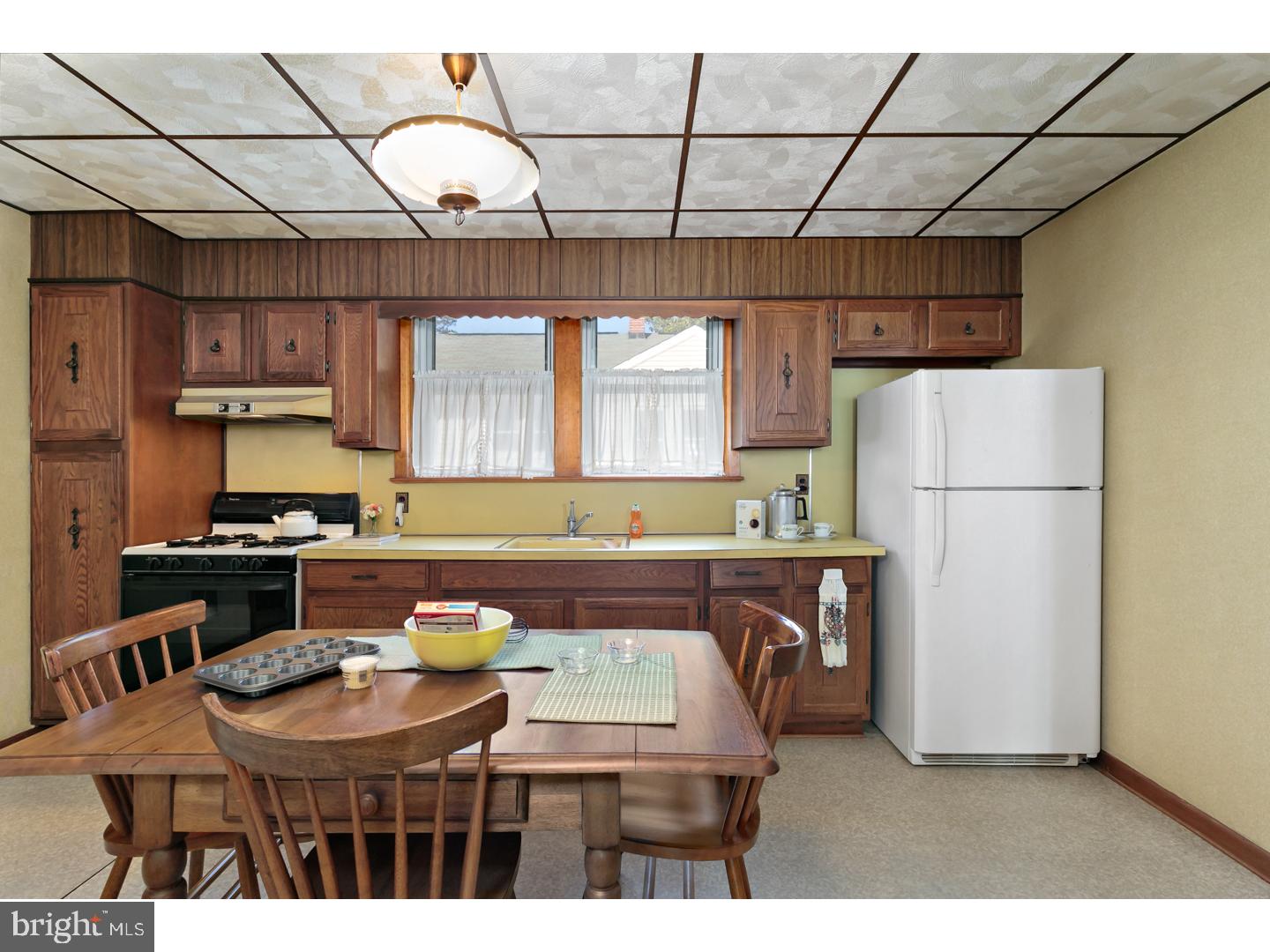 522 Heulings Avenue Riverside, NJ 08075 - Photo 9 of 22 a kitchen with stainless steel appliances granite countertop a sink a stove a refrigerator a center island and a cabinets