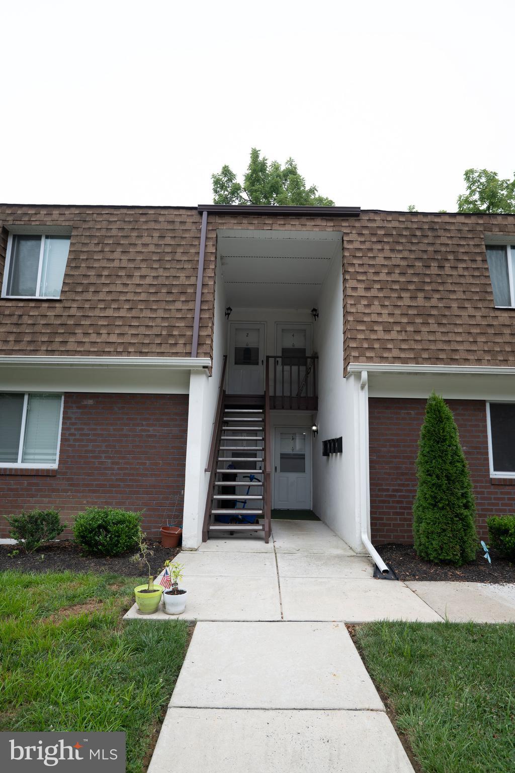 411 Stiles Avenue, Unit E3 Maple Shade, NJ 08052 - Photo 5 of 30 a view of a house with a yard