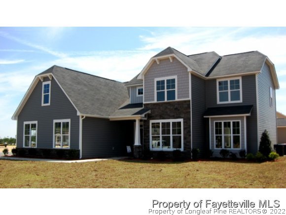 Lot 104 Carl Steiner Road Fayetteville, NC 28311 - Photo 1 of 15 a house view with a outdoor space
