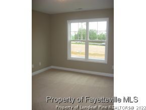 Lot 104 Carl Steiner Road Fayetteville, NC 28311 - Photo 11 of 15 a view of an empty room with a window