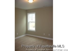 Lot 104 Carl Steiner Road Fayetteville, NC 28311 - Photo 12 of 15 a view of an empty room with a window