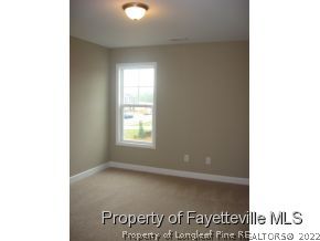 Lot 104 Carl Steiner Road Fayetteville, NC 28311 - Photo 13 of 15 a view of an empty room with a window